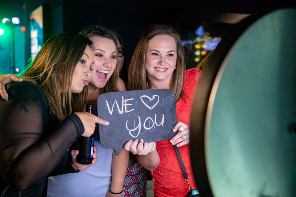 Guests at wedding using the Gif It Photo Booth